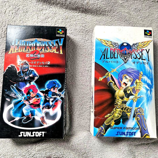 SNES Albert Odyssey 1 and 2 Set game cartridges with original labels for RPG titles by Sunsoft
