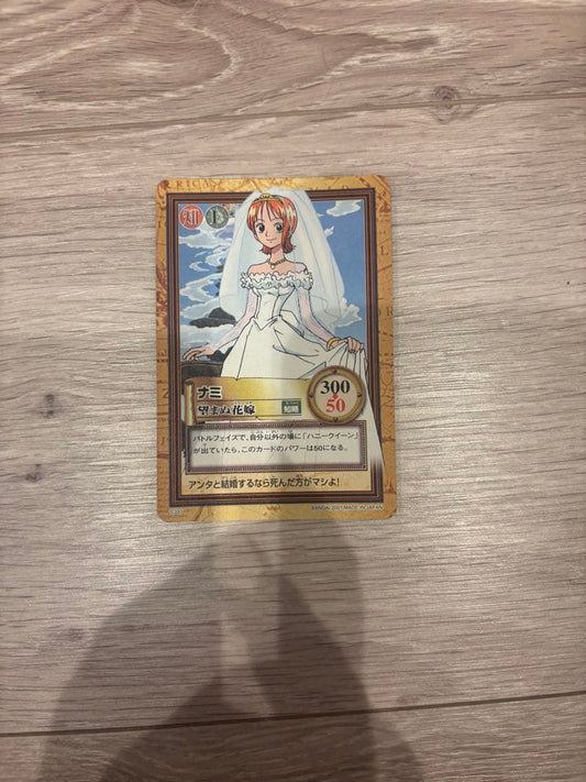 Bandai One Piece trading card showing Nami as Unwanted Bride in a wedding dress with Wisdom attribute