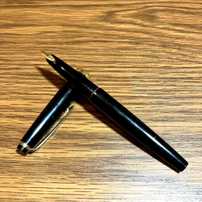 Pilot Black Cap Fountain Pen with black body and gold-plated nib and tip shown on white background