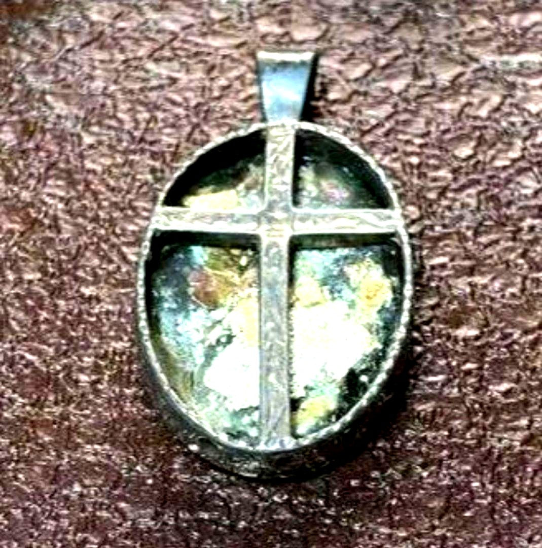 Silver pendant top with ancient Roman glass exhibiting an opal-like effect, measuring 1.3 cm by 2.5 cm