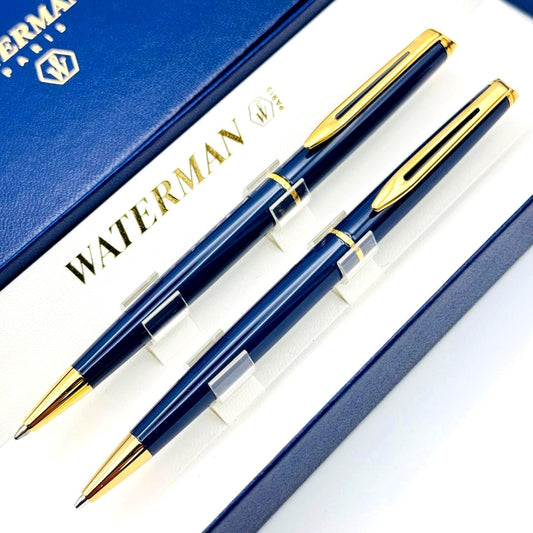 Waterman pen set featuring navy and gold ballpoint pen and mechanical pencil with original French case
