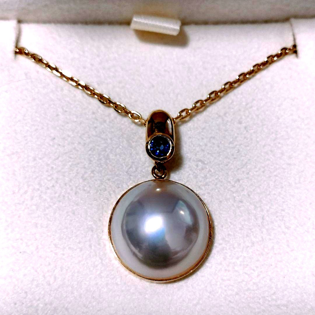 Tasaki Pearl Sapphire Necklace in 18K Yellow Gold with 60cm chain and 25mm x 14.5mm pendant