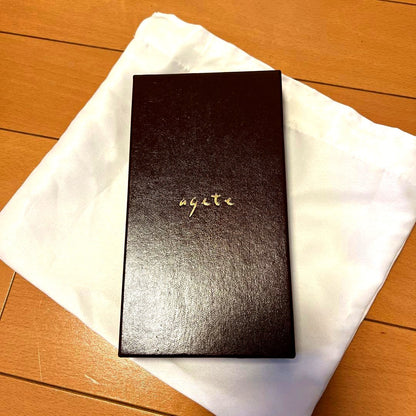 Agete Pearl Necklace featuring white pearls with included jewelry box, in excellent condition without damage or discoloration