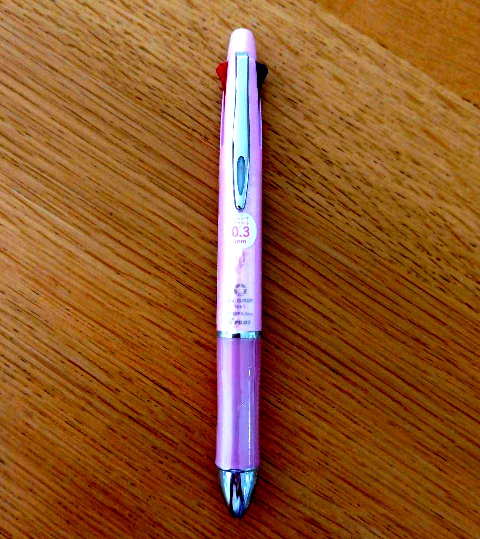 Pilot Dr. Grip 4+1 multi-function pen in pearl pink with 4-color ballpoint tips and 0.3mm mechanical pencil