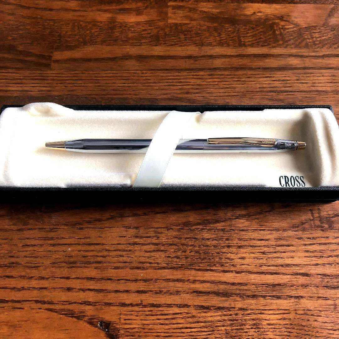 Like new Cross brand ballpoint pen with sleek design on a white background