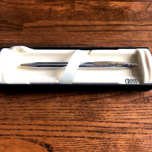 Like new Cross brand ballpoint pen with sleek design on a white background