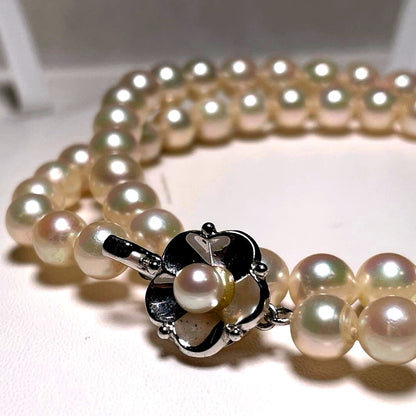 Akoya pearl necklace with 6.5-7.0mm round white pearls on a 42.6 cm silver chain