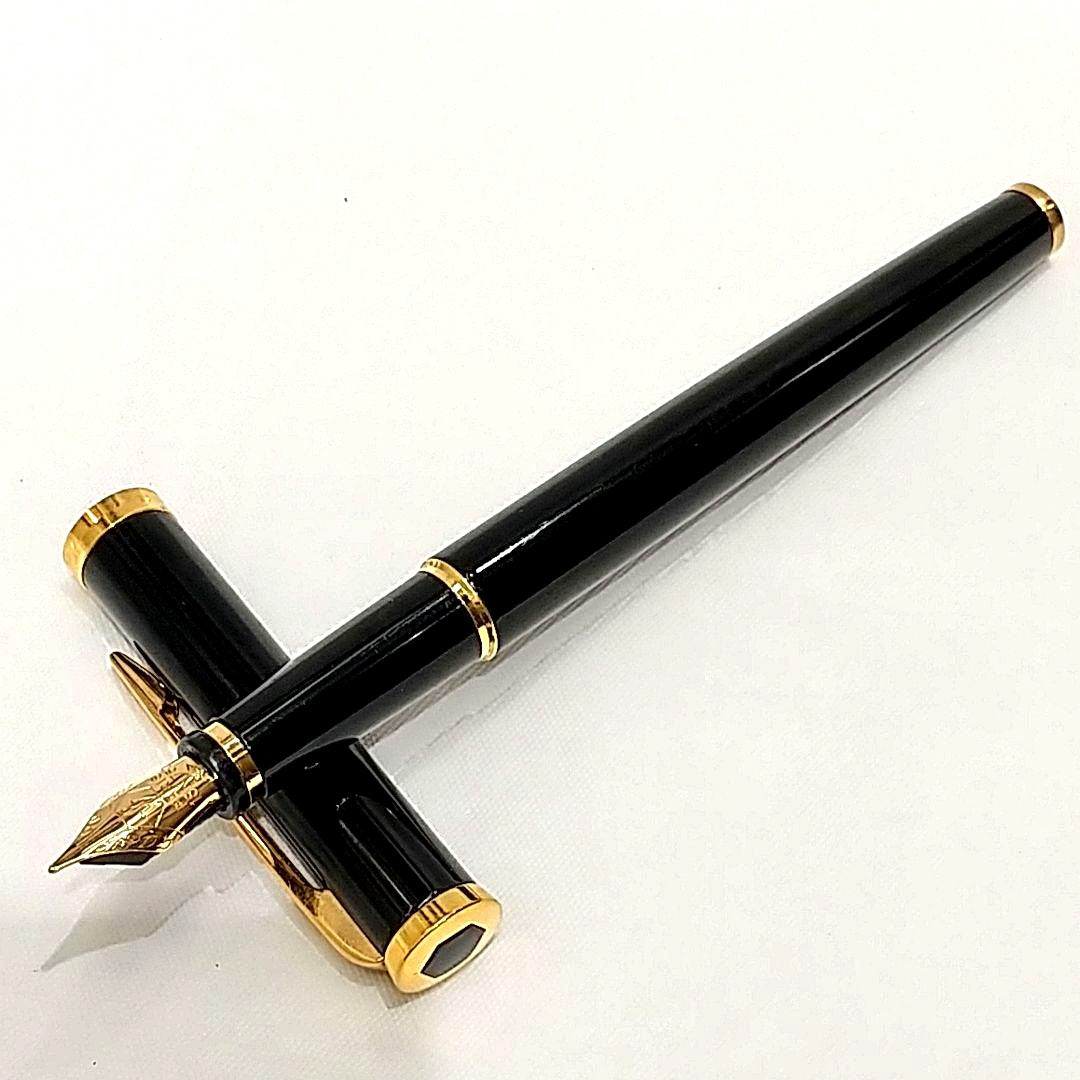 Waterman fountain pen with 18K 750 fine nib in black and gold finish with included box and instruction manual