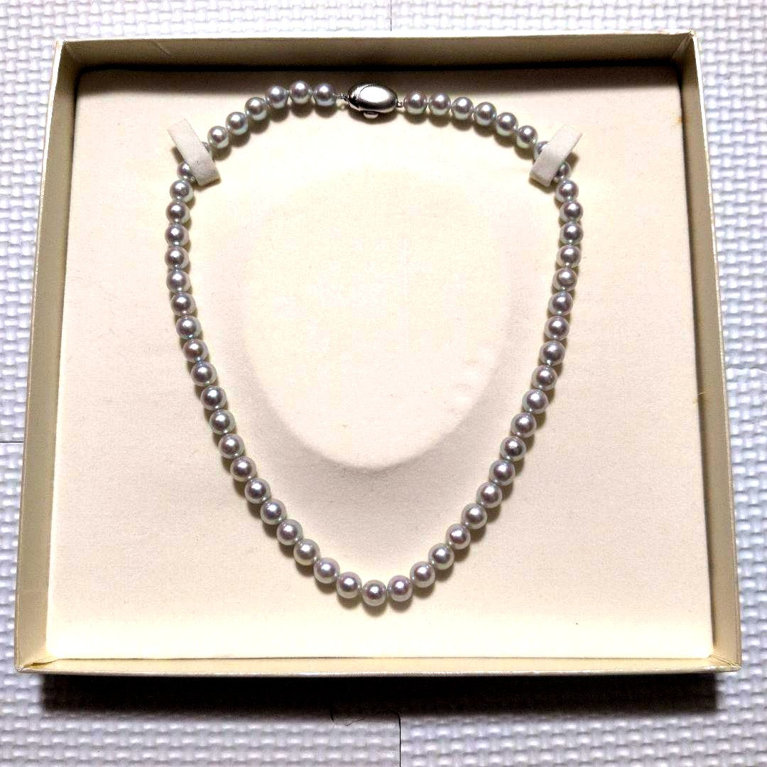 Takashi Pearl Necklace with 7.1-7.4mm pearls, 44cm length, and silver clasp on white background