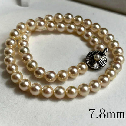 Teriyaki Akoya pearl necklace with 7.8mm pearls on a 41cm silver metal chain weighing 35 grams