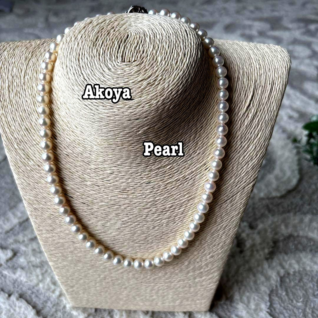 Akoya pearl necklace featuring 7mm white round beads on a 42cm silver-stamped string
