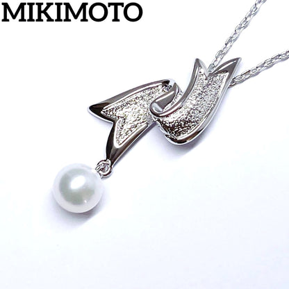 Mikimoto pearl necklace featuring 6.6mm pearls with a silver ribbon pendant on a 41cm chain