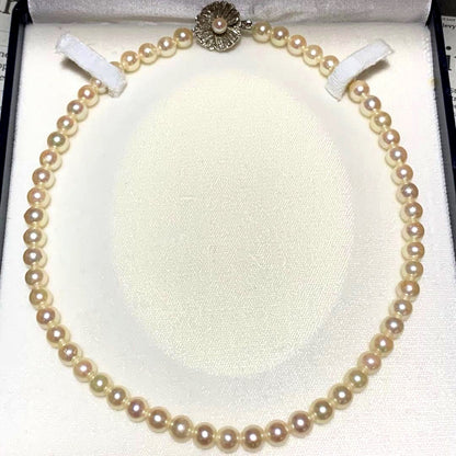 Akoya pearl necklace with silver clasp showing 7mm pearls on a 43 cm strand