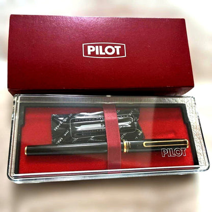 Pilot black fountain pen with gold decorations, included case, and two ink cartridges