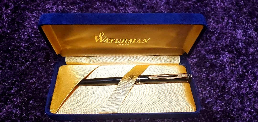 Unused Waterman ballpoint pen with sleek design and blue ink