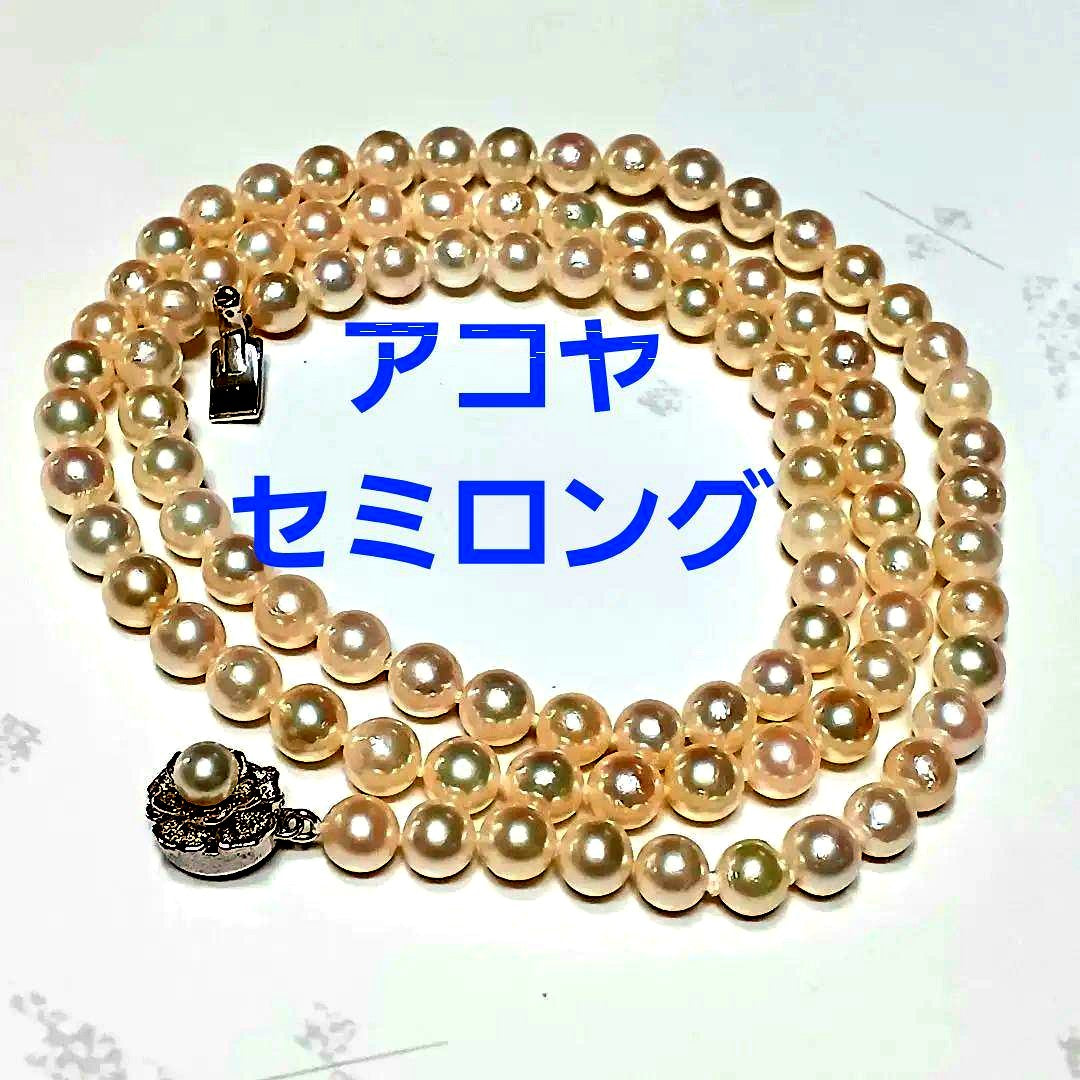 Akoya pearl semi-long necklace approx 64cm with 6-6.5mm white pearls showing slight irregularities and strong luster