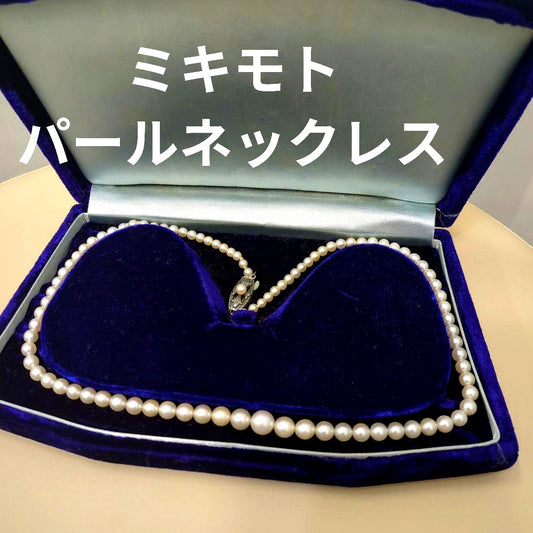 Old Mikimoto genuine pearl necklace with 7mm pearls measuring 38 cm in length