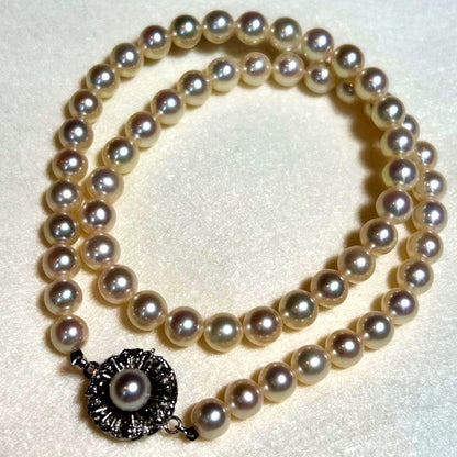 Akoya pearl necklace with 7.0-6.5 mm genuine pearls and silver clasp, 41 cm length