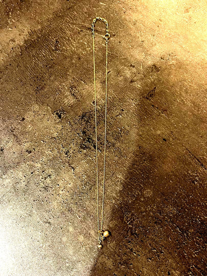 Agete Pearl Necklace in 10k gold with white pearls on a white background showing 38-42cm length