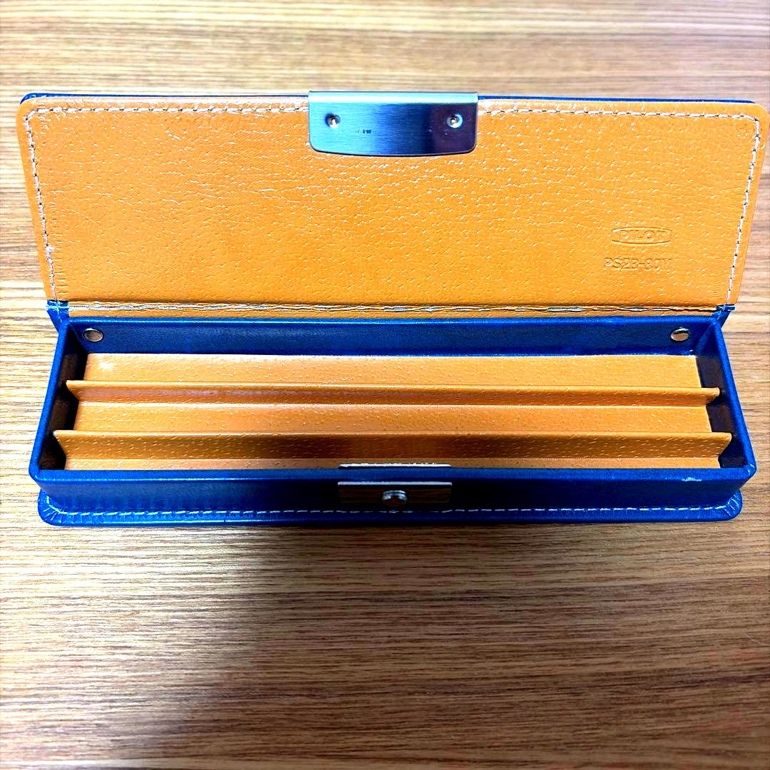 Discontinued navy blue PILOT leather hard pen case model PS2B-80M holding 2 pens and spare ink