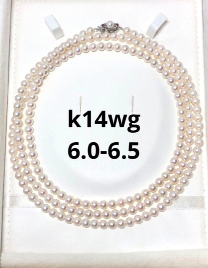 Long Akoya pearl necklace with white round Hanadama pearls measuring 6.0-6.5 mm on K14WG chain