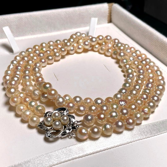 Two-strand Hanadama Akoya pearl necklace with 6.3-7.0mm round white pearls and sterling silver clasp