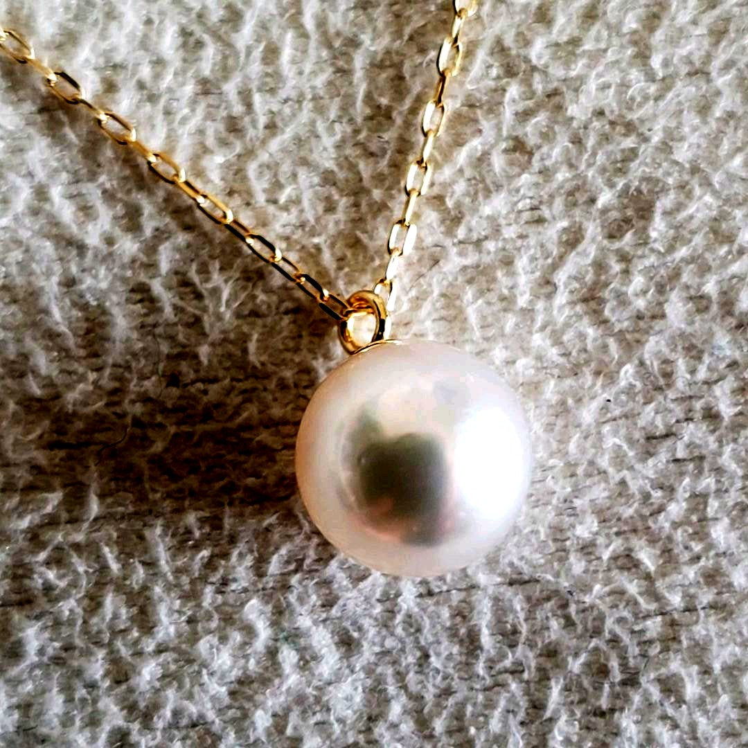 Oyster pearl necklace featuring 7mm Akoya pearls with a 36-40 cm adjustable K18 gold chain