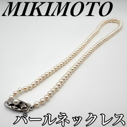 MIKIMOTO pearl necklace with white 7mm pearls and silver fittings, classic design, used condition