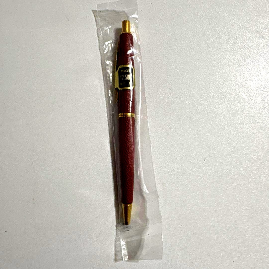 Pilot Leather-wrapped Ballpoint Pen ② in black with silver accents, 130mm length