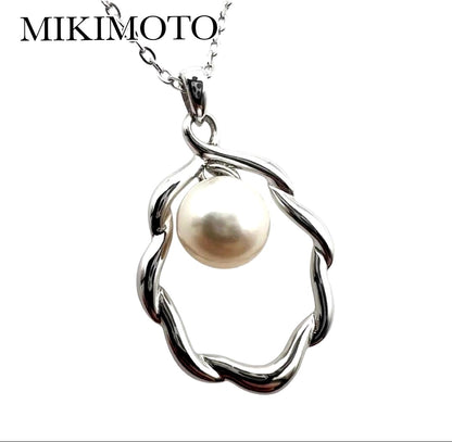 MIKIMOTO silver pendant necklace with 7mm bead, 1.8 cm by 2.5 cm pendant, 39.5 cm chain length