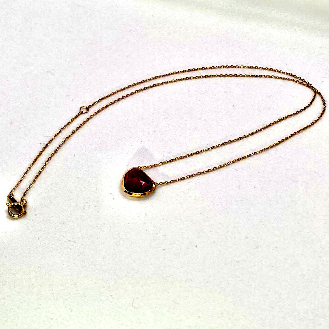 Agete large ruby necklace in K10 yellow gold with a 45 cm chain, featuring a prominent red ruby pendant