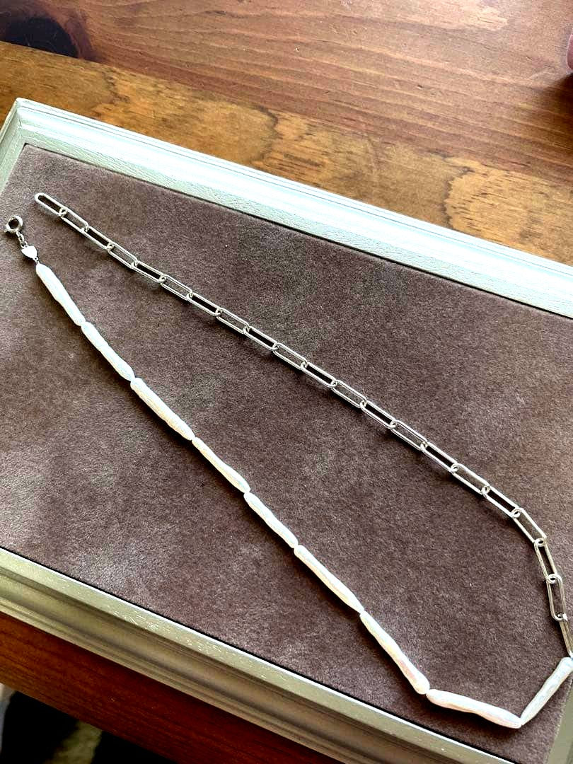 agete Pearl Necklace with round white pearls on a delicate chain