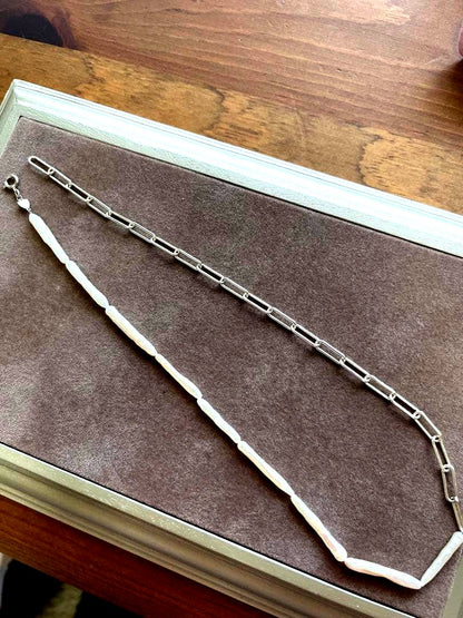 agete Pearl Necklace with round white pearls on a delicate chain