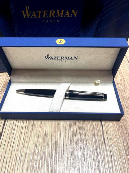 Waterman black ballpoint pen with matching case in blue box featuring gold logo