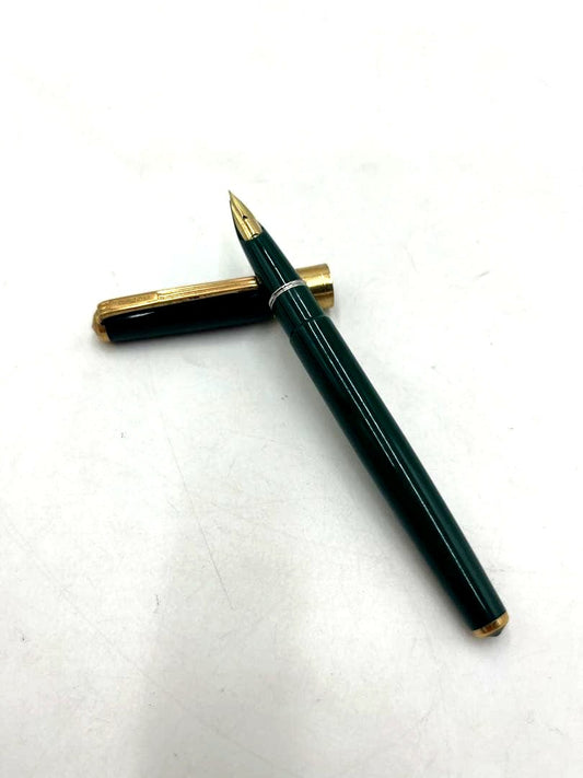 PILOT vintage fountain pen made of 14K green gold displayed on white background