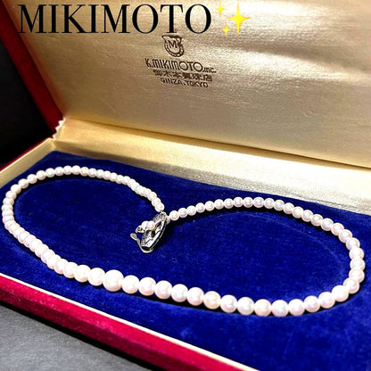 Mikimoto Akoya pearl graduated necklace with 7mm pearls, 40cm length, sterling silver clasp