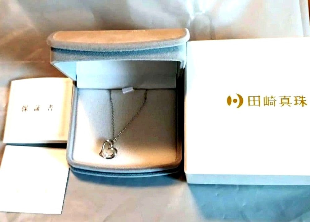 Tasaki Pearl Heart Necklace with heart motif and pearl decoration shown with dedicated case