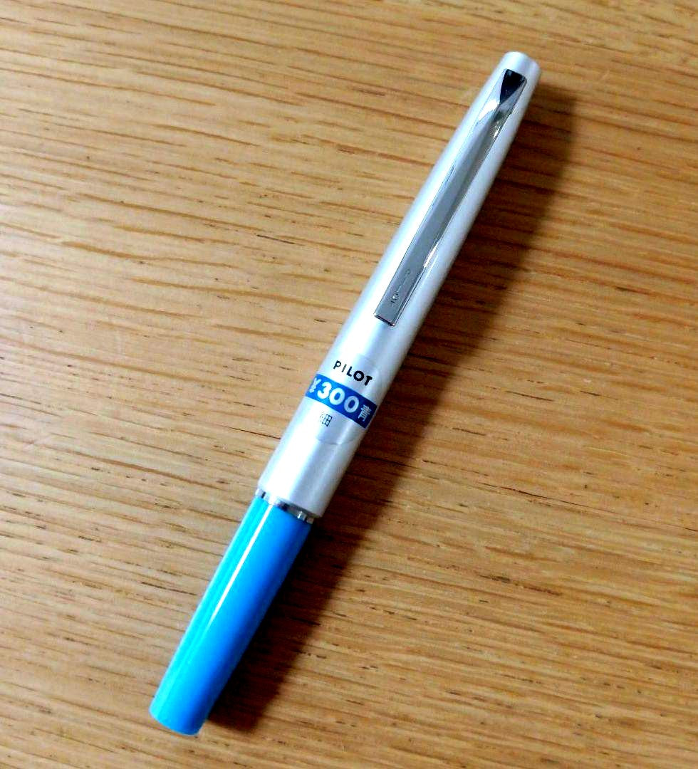 Discontinued Pilot short ballpoint pen in blue and silver with minor storage scratches