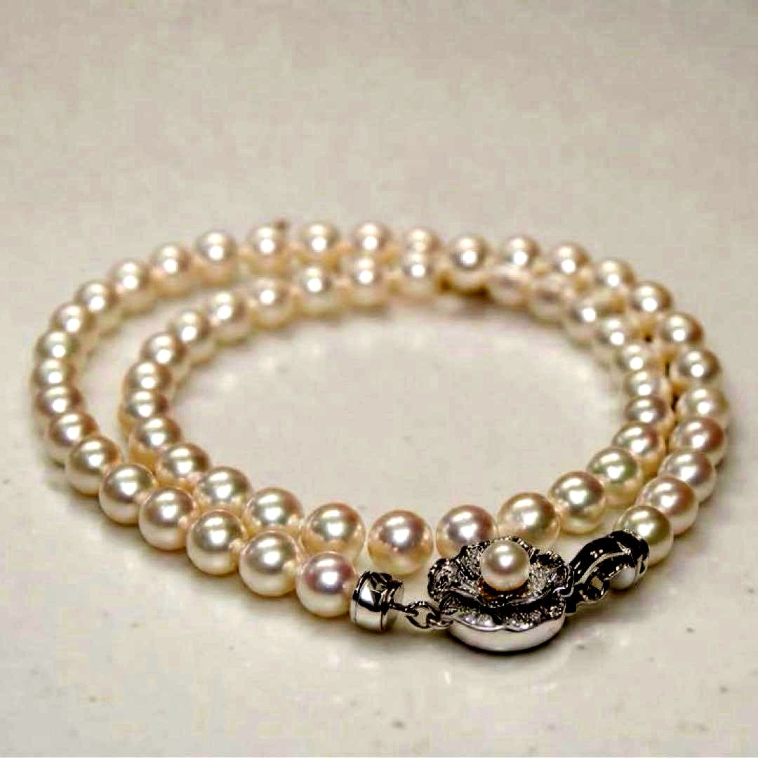 Akoya pearl necklace with silver imprint featuring 6.0-6.28mm pearls, approximately 42 cm long