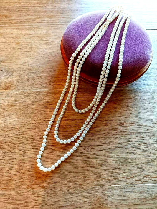 Agete freshwater pearl long necklace measuring 2 meters with lustrous white pearls
