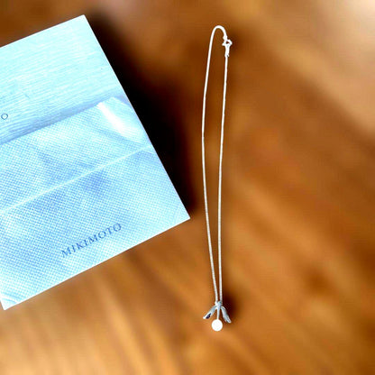 MIKIMOTO Silver Pearl Necklace featuring lustrous pearls on a delicate silver chain