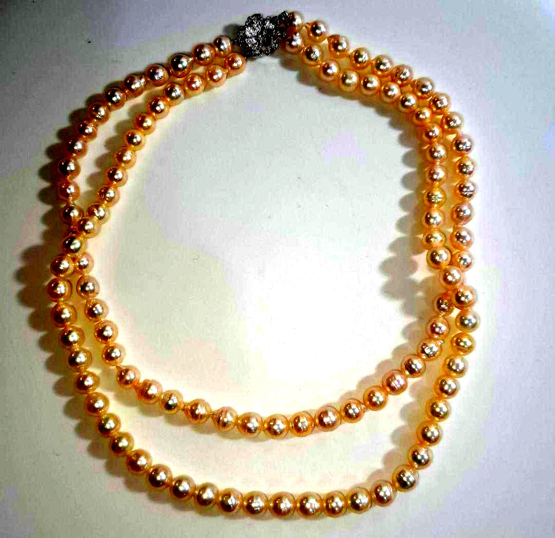 Double strand Akoya pearl necklace with 6mm white pearls and decorative clasp