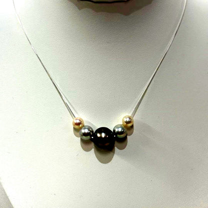 Akoya pearl necklace with black peacock pearl pendant and varying pearl sizes on a 42cm strand