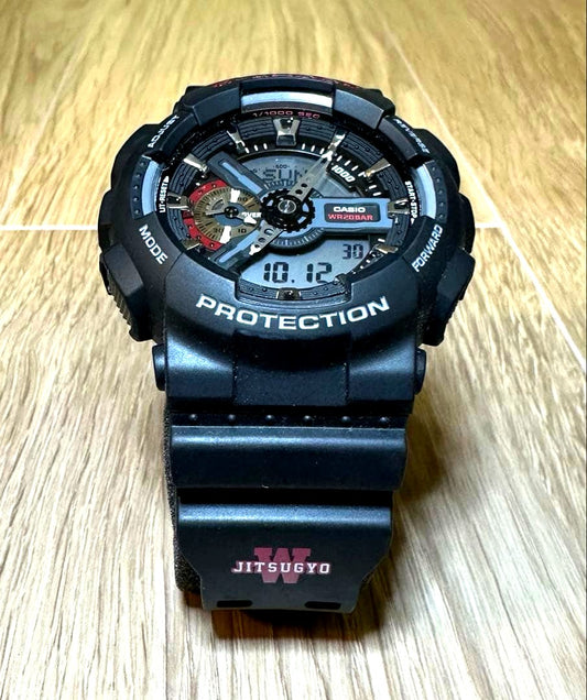 Casio G-Shock GA-110 watch with Waseda Jitsugyo logo on belt in original box