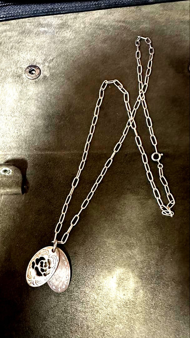 Agete 925 sterling silver shell necklace approximately 50cm long on a white background