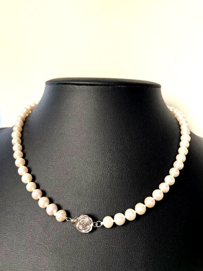 Akoya pearl necklace featuring 6-6.5mm pearls and flower pattern on 43cm 925 silver chain