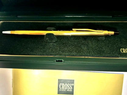 Gold CROSS ballpoint pen model クロ with sleek design and smooth finish