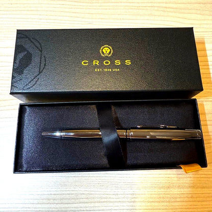 Cross silver ballpoint pen with dedicated case on white background
