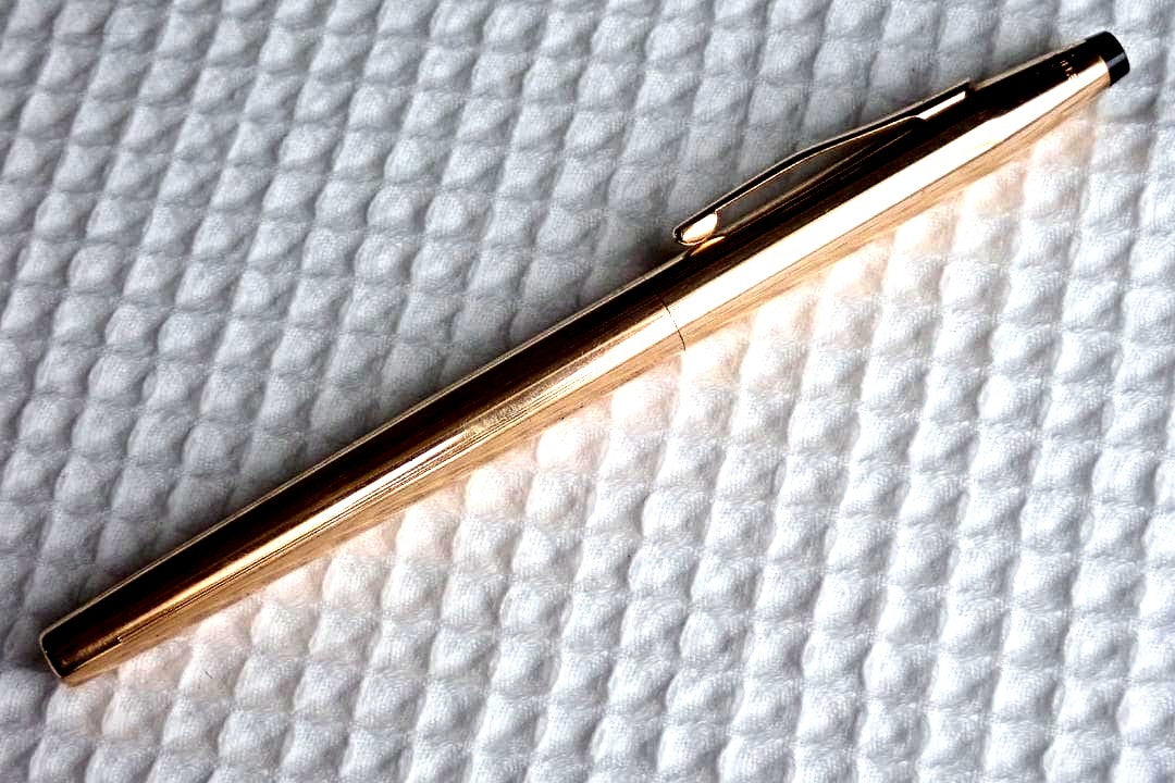 Cross Selectip rollerball pen with 1/20 14K gold filled barrel and three refill types included
