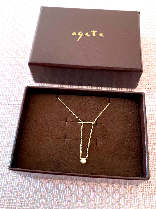 Agete gold tone K10 diamond necklace with 0.03 carat diamond pendant